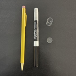 Yellow pen and Expo marker on a dark gray background