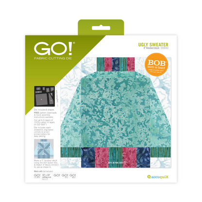 AccuQuilt GO! Ugly Sweater 8" Finished Block on Board fabric cutting die packaging, SKU 55930, showing completed sweater block in teal batik fabric with pink and navy accents

