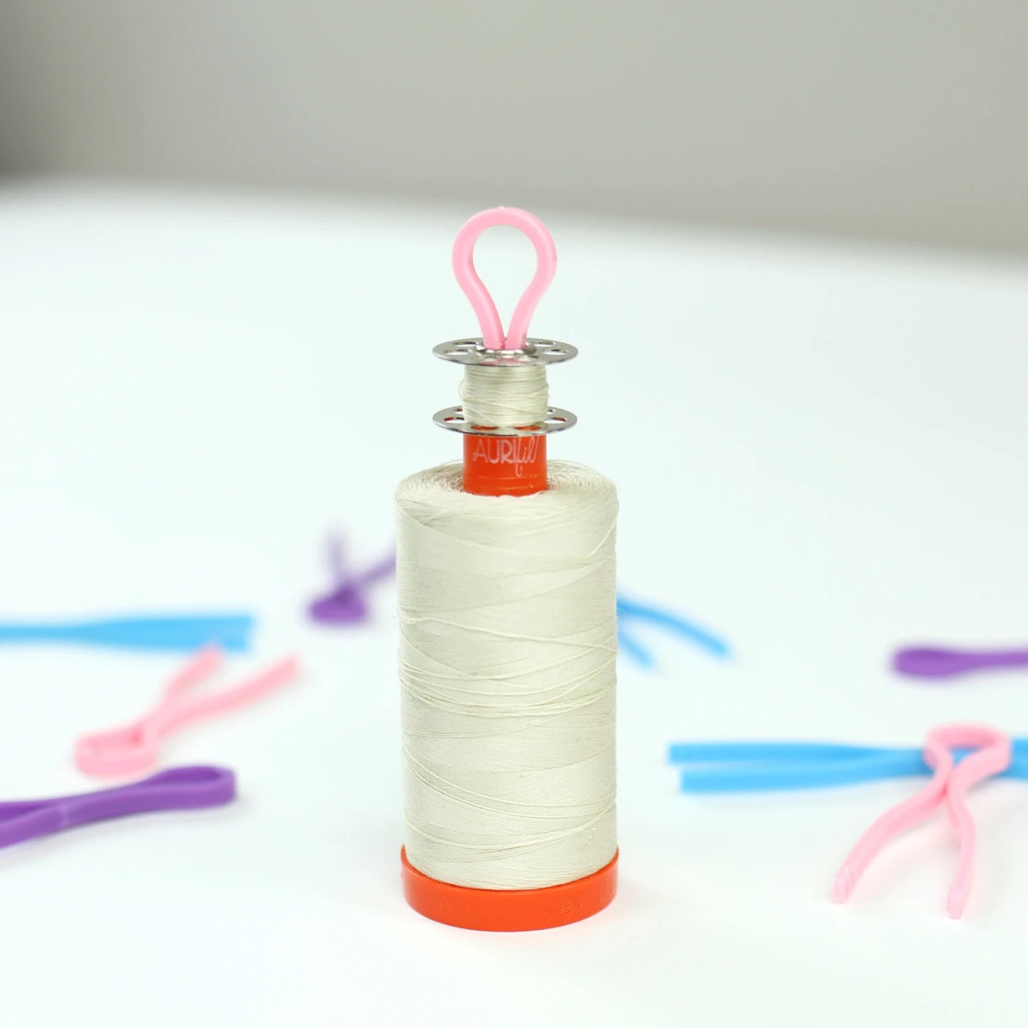 Bobbin Buddies keeping bobbins and thread spools organised together