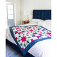 AccuQuilt GO! Carpenter's Wheel 18" Assembles Quilt in a lifestyle setting on a bed