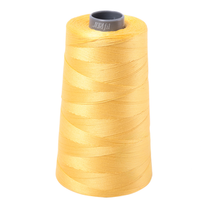 Aurifil embroidery thread spool in Pale Yellow (1135) - 28wt 3300m