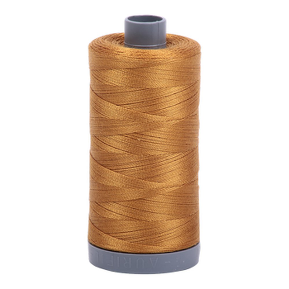 Aurifil embroidery thread spool in Brass (2975) - 28wt 750m