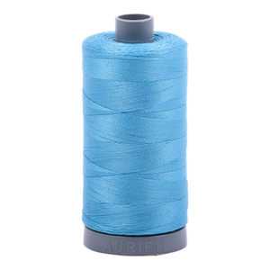 Aurifil embroidery thread spool in Bright Teal (1320) - 28wt 750m