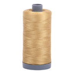 Aurifil embroidery thread spool in Light Brass (2920) - 28wt 750m