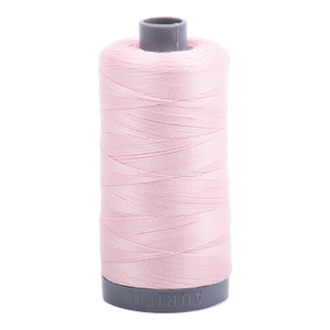 Aurifil embroidery thread spool in Pale Pink (2410) - 28wt 750m
