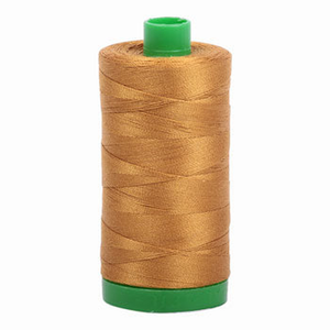 Aurifil embroidery thread spool in Brass (2975) - 40wt 1000m