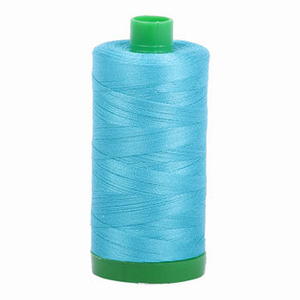 Aurifil embroidery thread spool in Bright Turquoise (5005) - 40wt 1000m