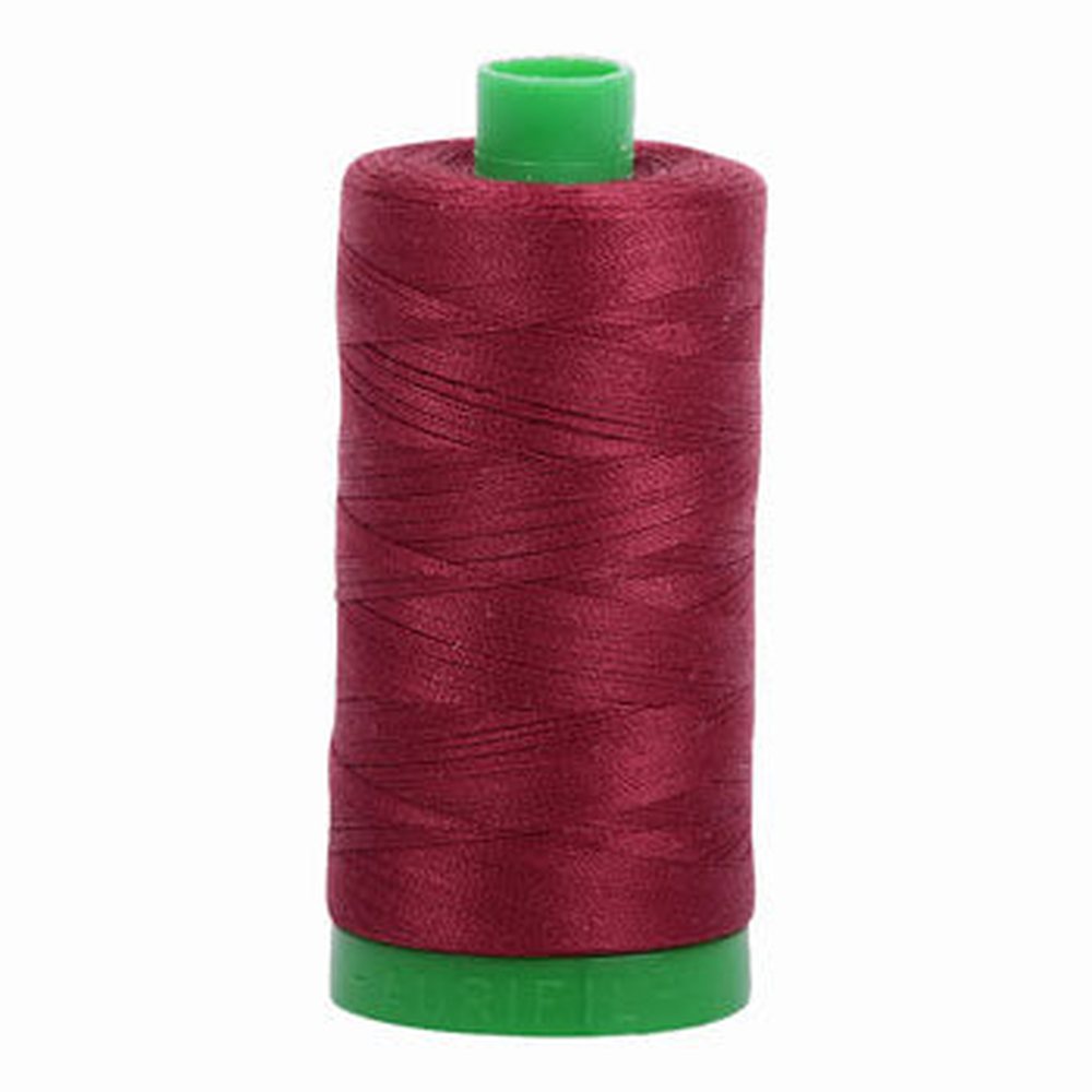 Aurifil embroidery thread spool in Dark Carmine Red (2460) - 40wt 1000m