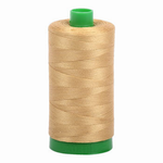 Aurifil embroidery thread spool in Light Brass (2920) - 40wt 1000m