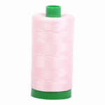 Aurifil embroidery thread spool in Pale Pink (2410) - 40wt 1000m