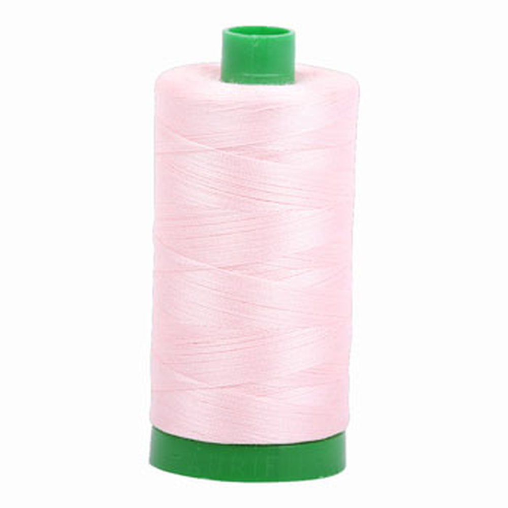 Aurifil embroidery thread spool in Pale Pink (2410) - 40wt 1000m