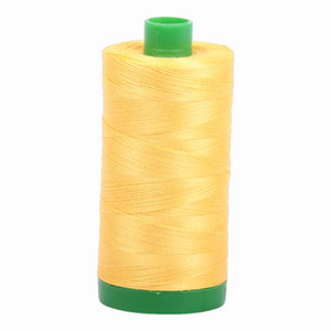 Aurifil embroidery thread spool in Pale Yellow (1135) - 40wt 1000m