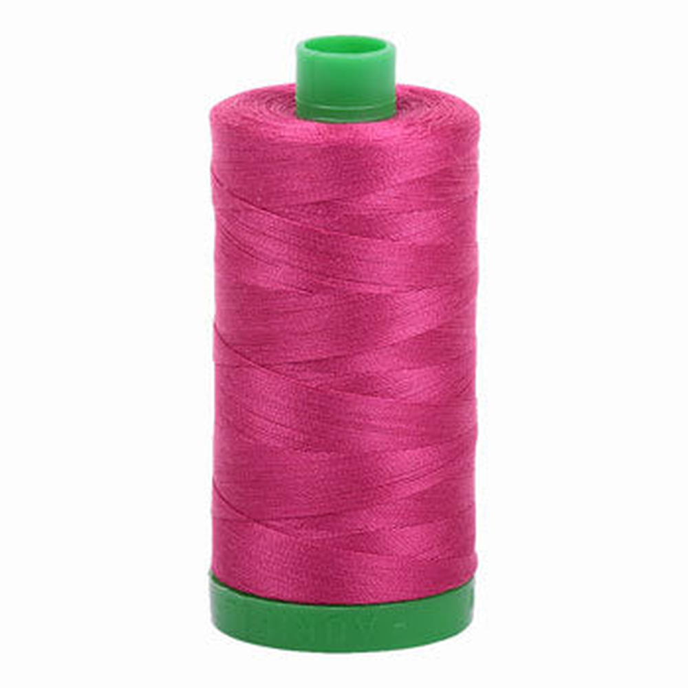 Aurifil embroidery thread spool in Red Plum (1100) - 40wt 1000m