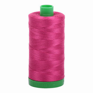 Aurifil embroidery thread spool in Red Plum (1100) - 40wt 1000m