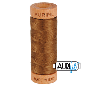 Aurifil embroidery thread spool in Dark Antique Gold (2372) - 80wt 274m