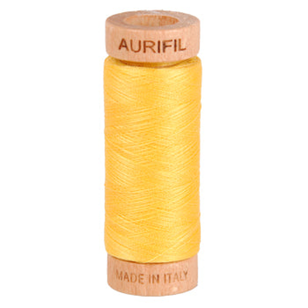 Aurifil embroidery thread spool in Pale Yellow (1135) - 80wt 274m