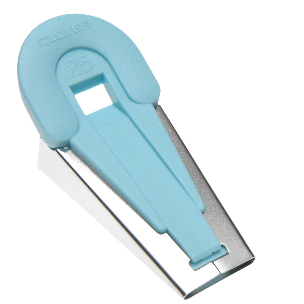 Clover fusible tape maker - tool for making iron-on bias tape - in use