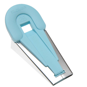 Clover fusible tape maker - tool for making iron-on bias tape - in use