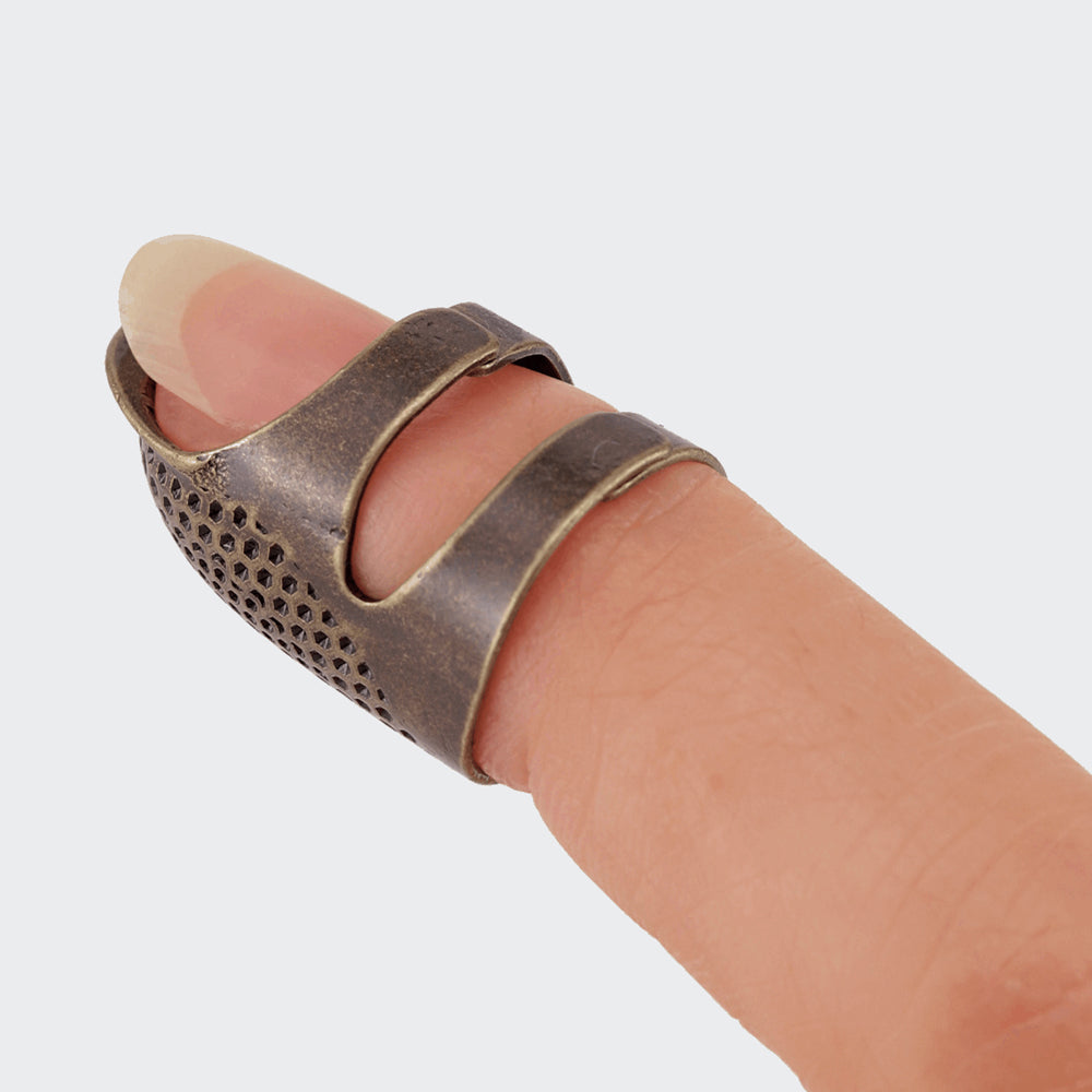 Clover thimble - finger protection for hand sewing - packaging