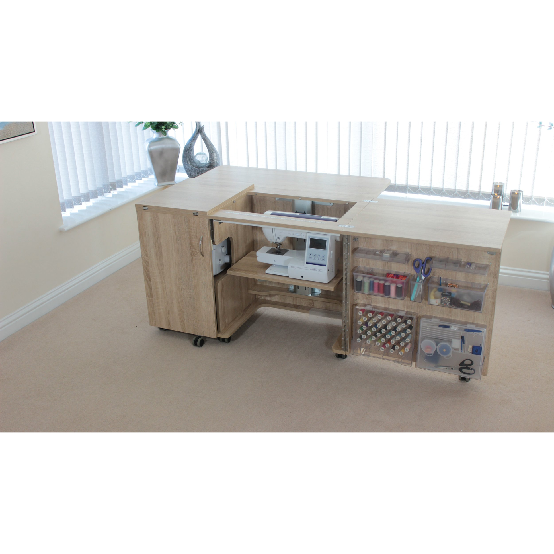 Horn Eclipse XL cabinet with sewing machine lowered on the maxi lift