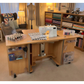 Horn Gemini Long Lift cabinet set up as a sewing studio workstation