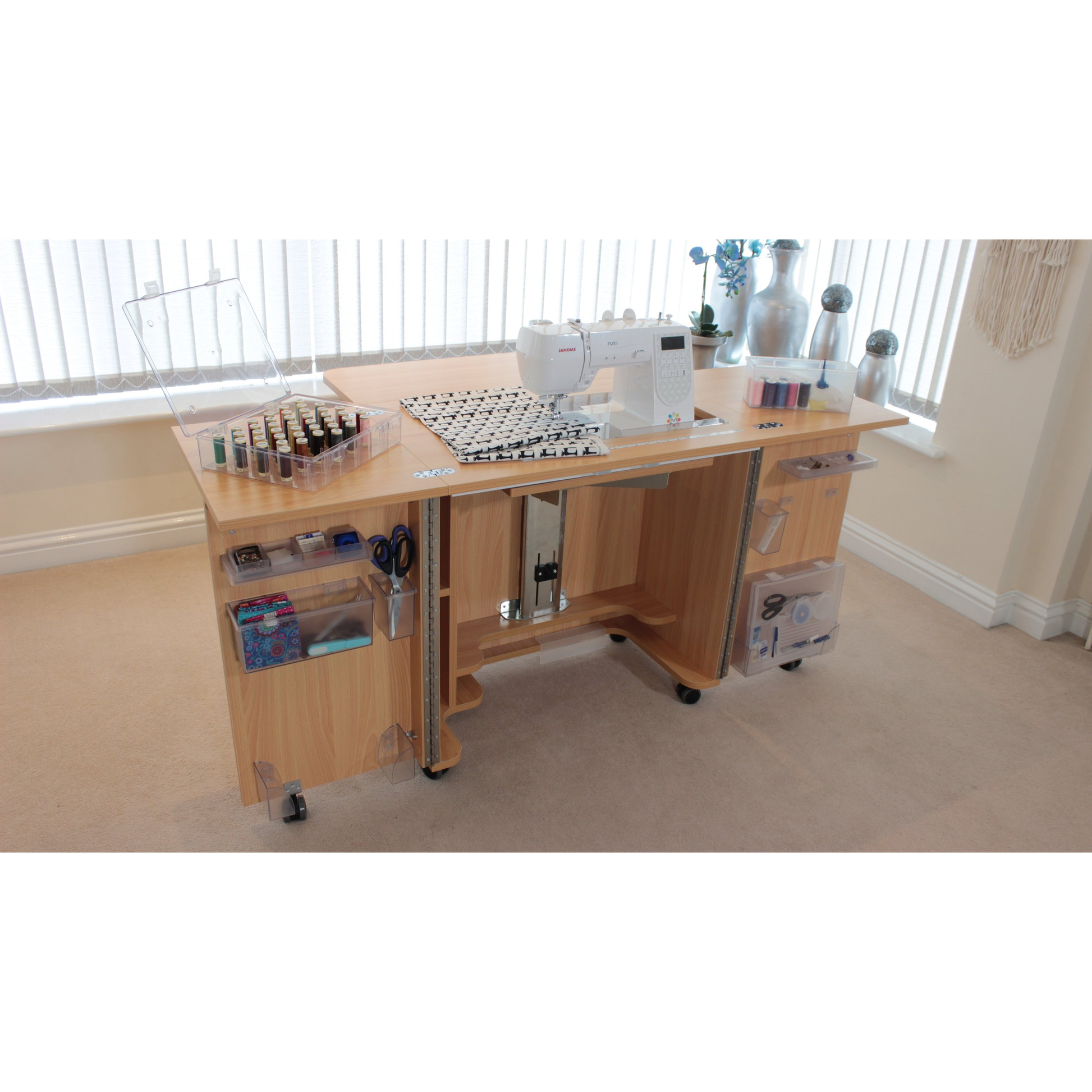 Horn Gemini cabinet open with sewing machine and thread storage