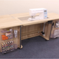 Horn Geni-e cabinet open with sewing machine and door storage bins
