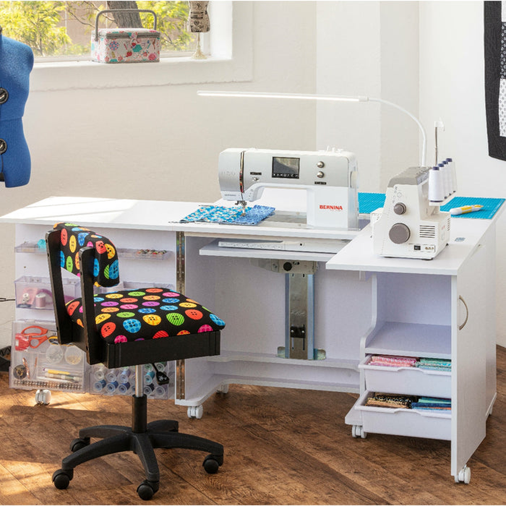 Horn Nova XL cabinet in use with sewing machine and cutting mat surface