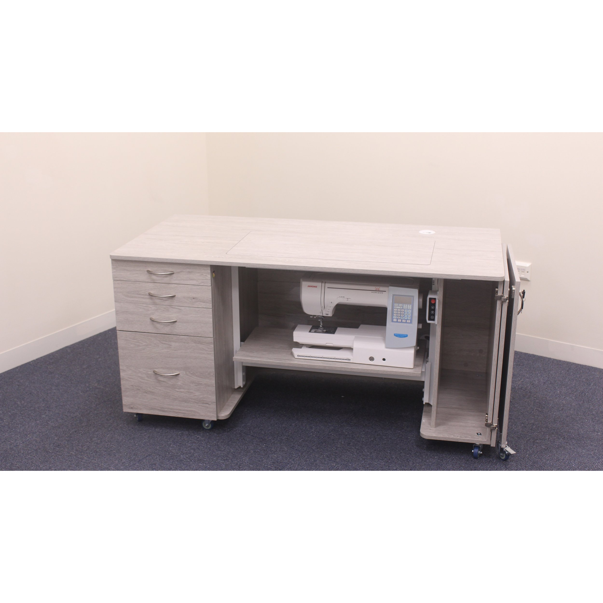 Horn Tasman cabinet open with sewing machine raised on the lift