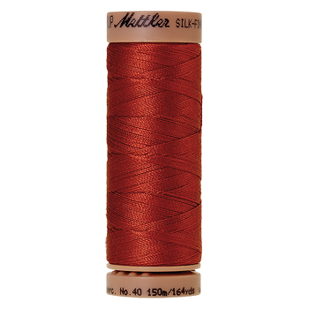Mettler sewing thread spool in Brick (1074) - 40wt 150m