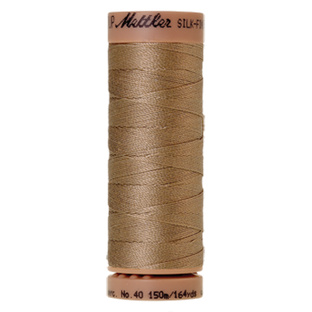 Mettler sewing thread spool in Caramel Cream (0285) - 40wt 150m