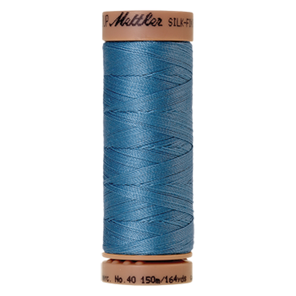Mettler sewing thread spool in Reef Blue (0338) - 40wt 150m