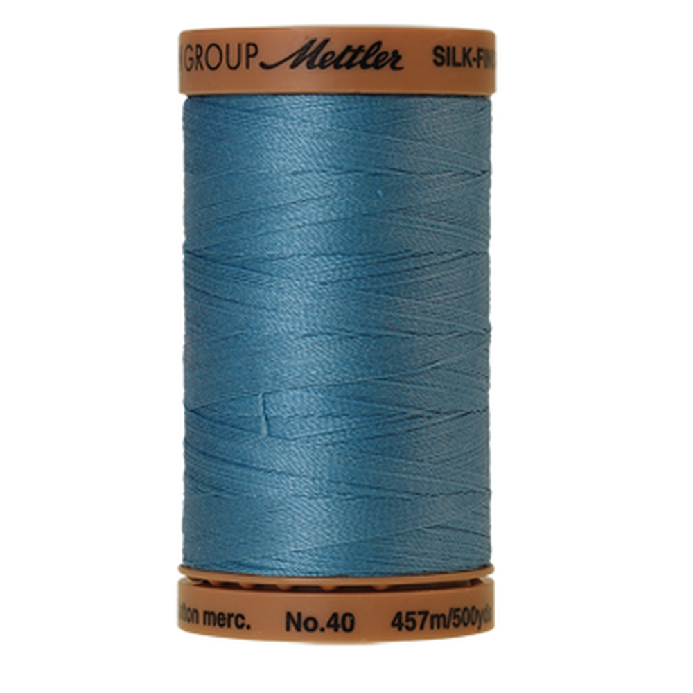 Mettler sewing thread spool in Reef Blue (0338) - 40wt 457m