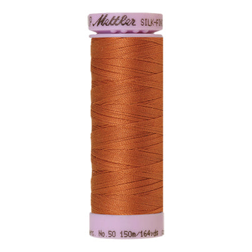 Mettler sewing thread spool in Amber Brown (2103) - 50wt 150m