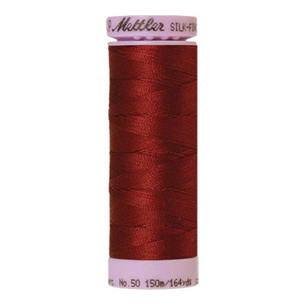 Mettler sewing thread spool in Blue Elderberry (1348) - 50wt 150m