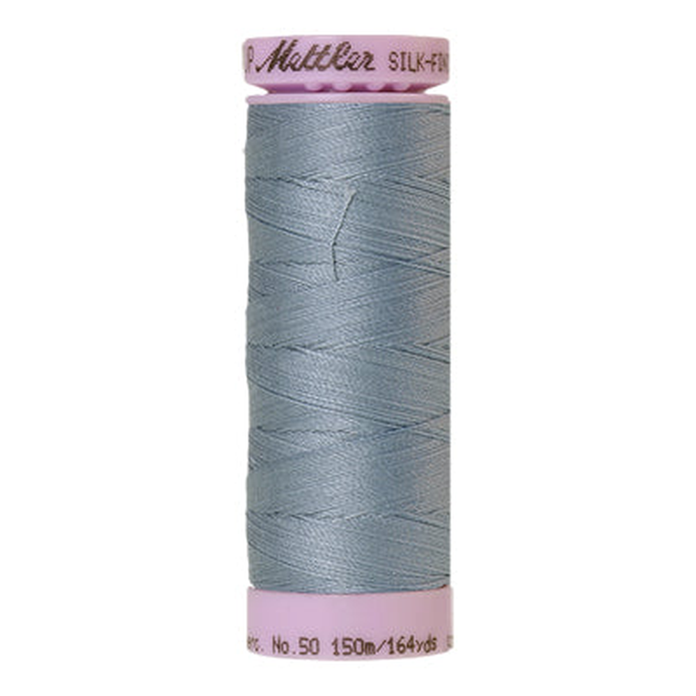 Mettler sewing thread spool in Blue Speedwell (1342) - 50wt 150m