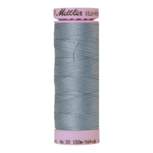 Mettler sewing thread spool in Blue Speedwell (1342) - 50wt 150m