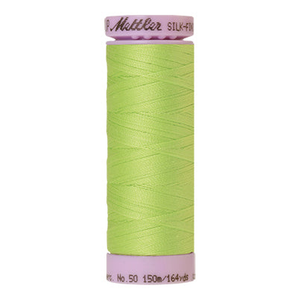 Mettler sewing thread spool in Bright Lime Green (1528) - 50wt 150m