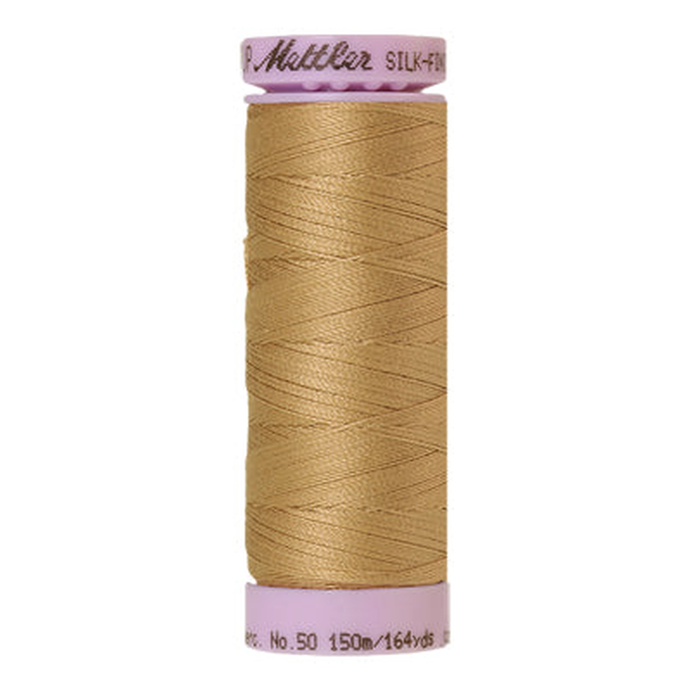 Mettler sewing thread spool in Caramel Cream (0285) - 50wt 150m