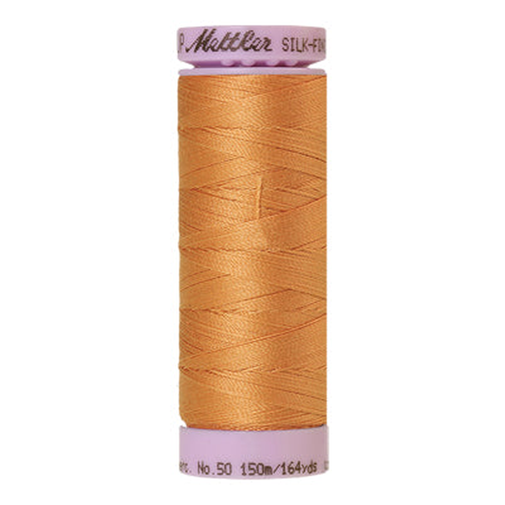 Mettler sewing thread spool in Dried Apricot (1172) - 50wt 150m