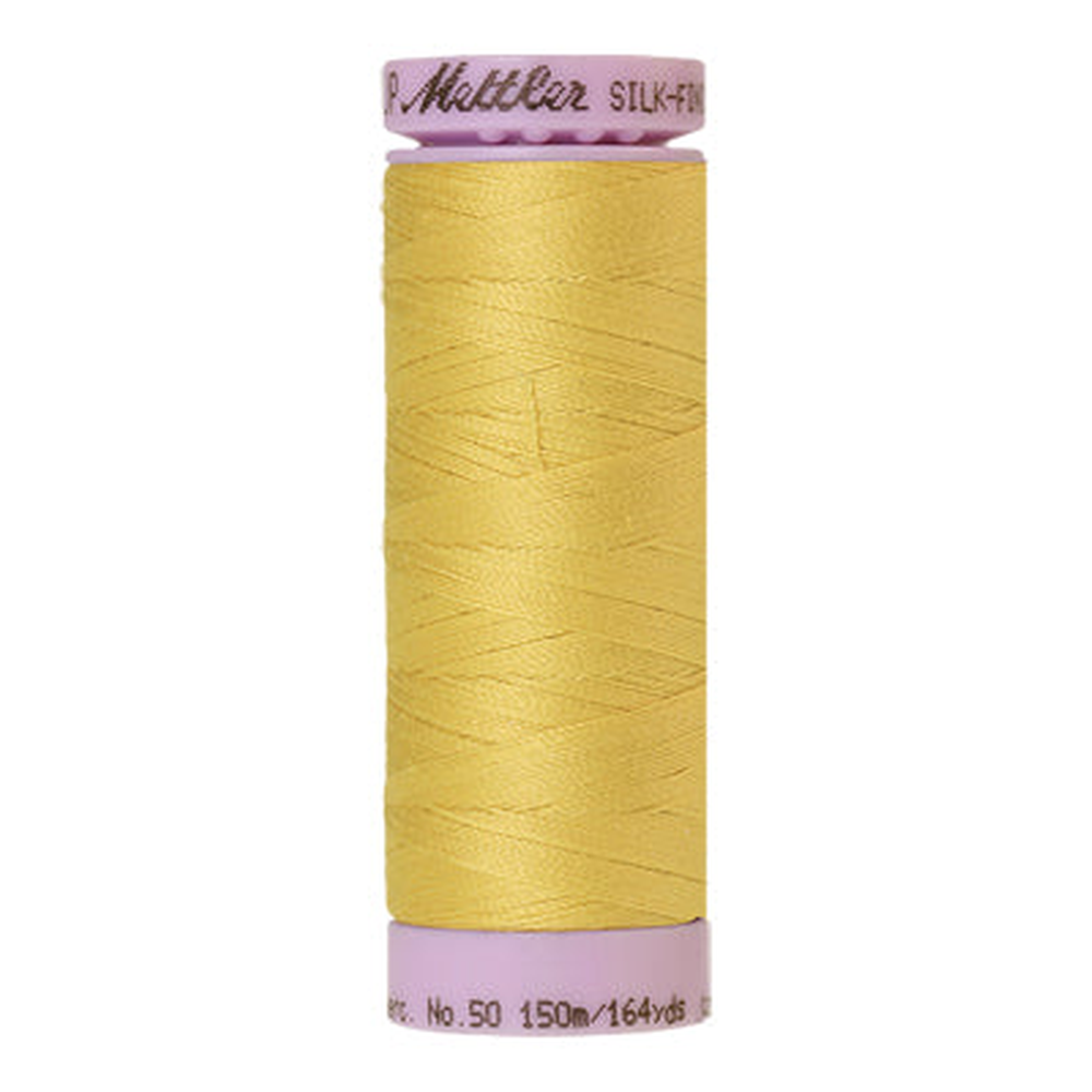 Mettler sewing thread spool in Lemon Peel (0115) - 50wt 150m