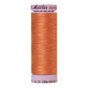 Mettler sewing thread spool in Melon (1073) - 50wt 150m
