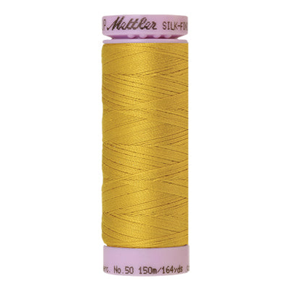 Mettler sewing thread spool in Nugget Gold (0117) - 50wt 150m