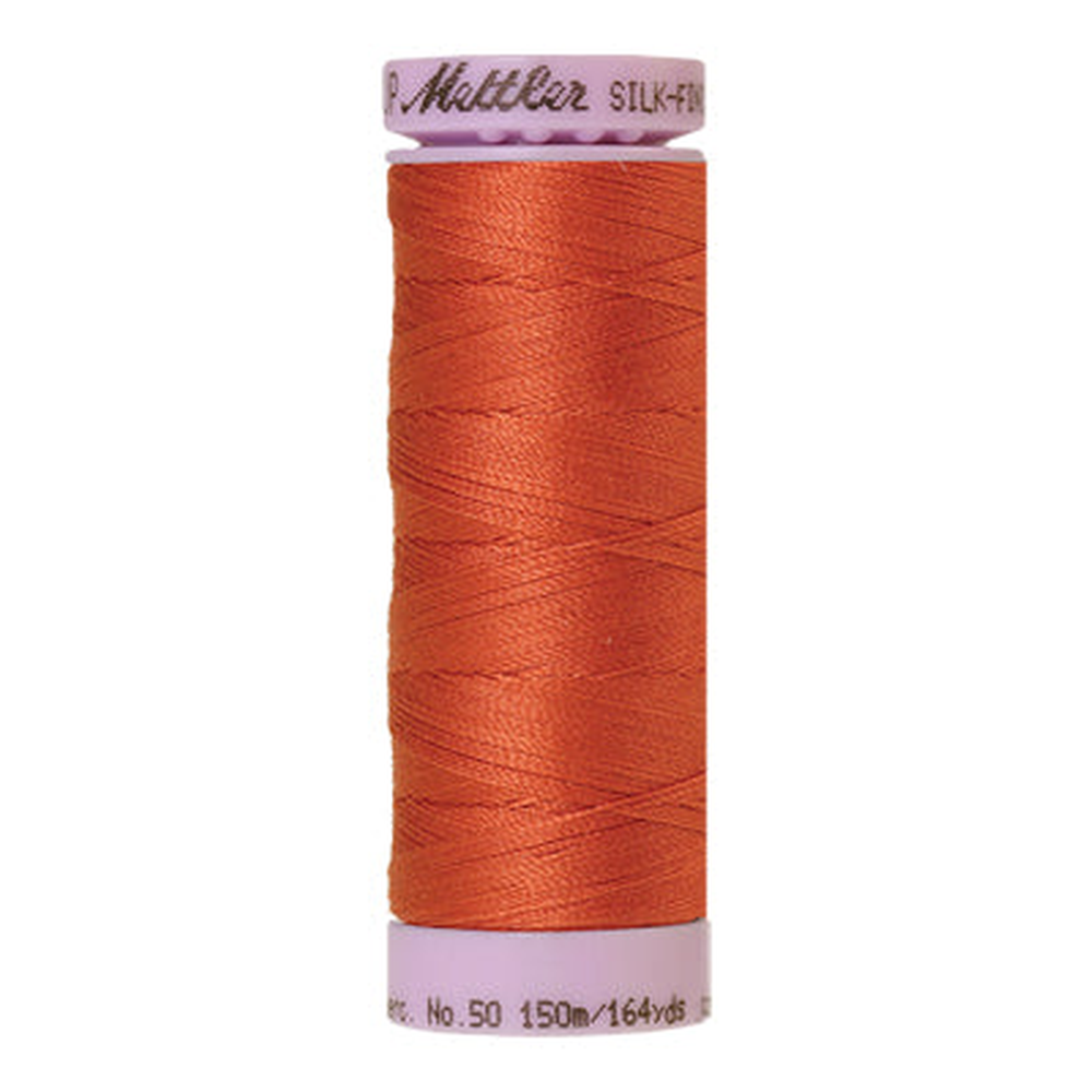 Mettler sewing thread spool in Reddish Ocher (1288) - 50wt 150m