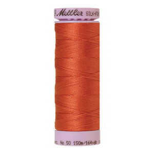 Mettler sewing thread spool in Reddish Ocher (1288) - 50wt 150m
