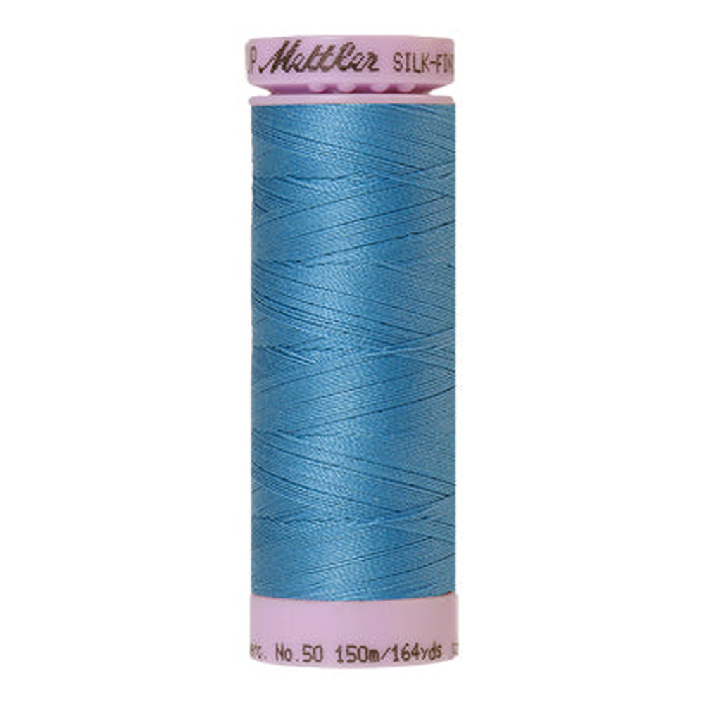 Mettler sewing thread spool in Reef Blue (0338) - 50wt 150m
