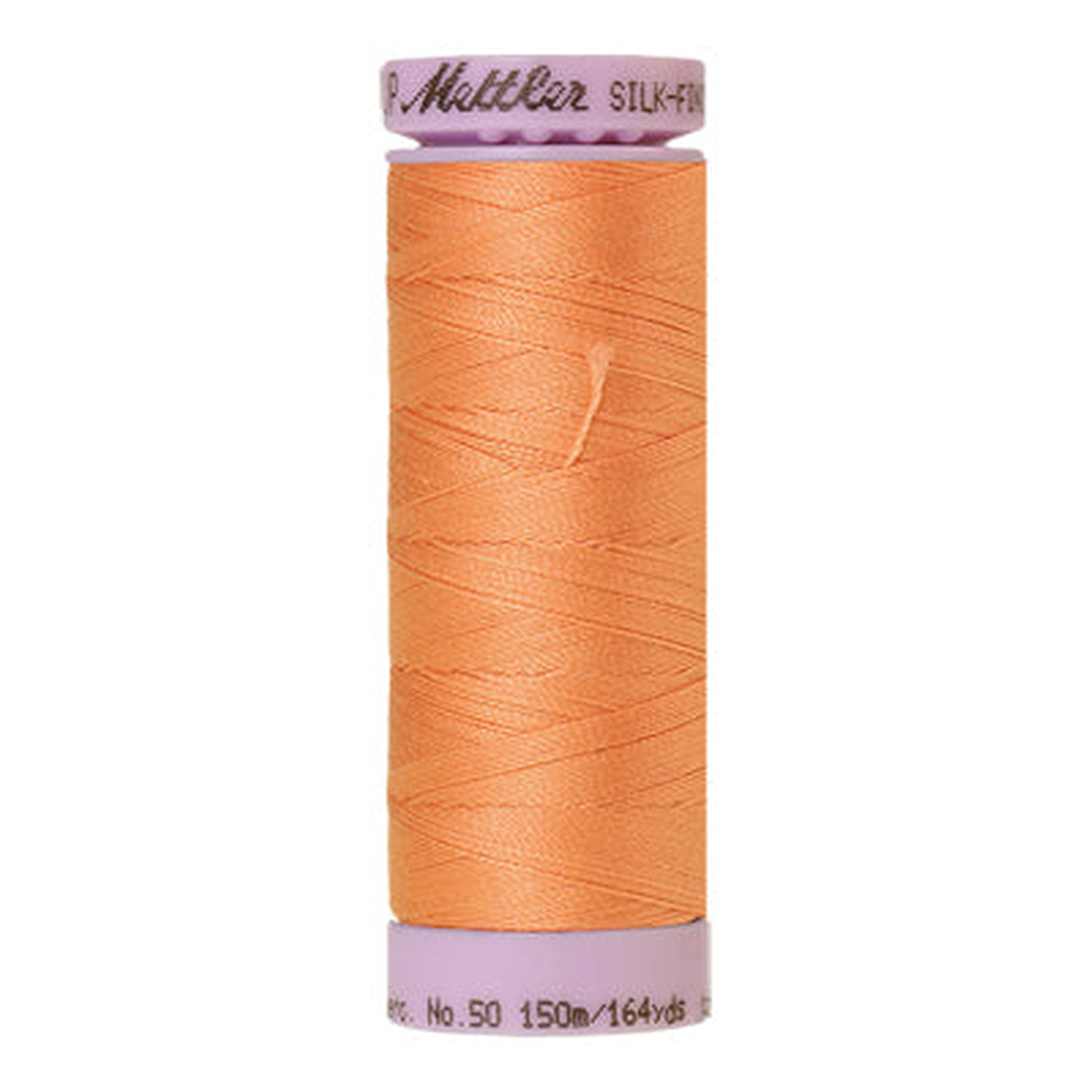 Mettler sewing thread spool in Shell Coral (1522) - 50wt 150m