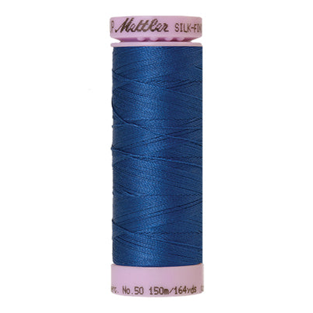Mettler sewing thread spool in Snorkel Blue (0697) - 50wt 150m