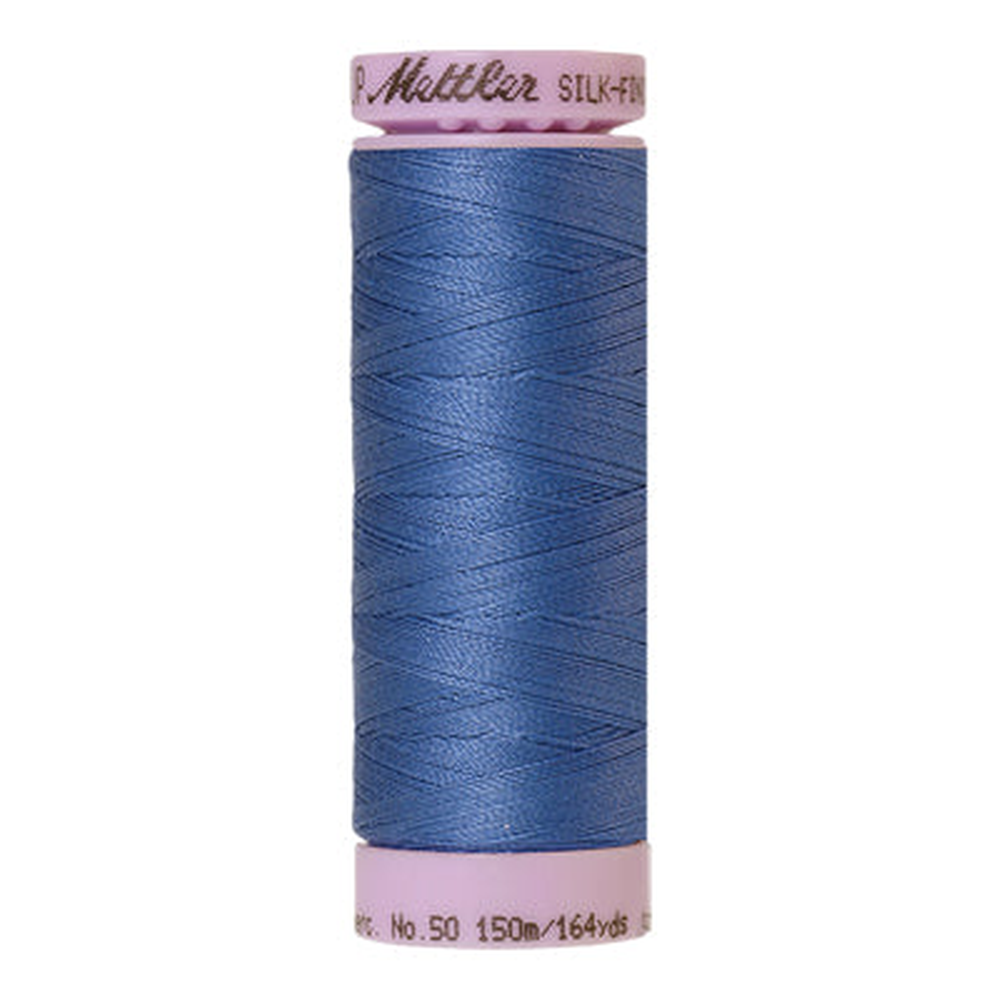 Mettler sewing thread spool in Tufts Blue (1464) - 50wt 150m