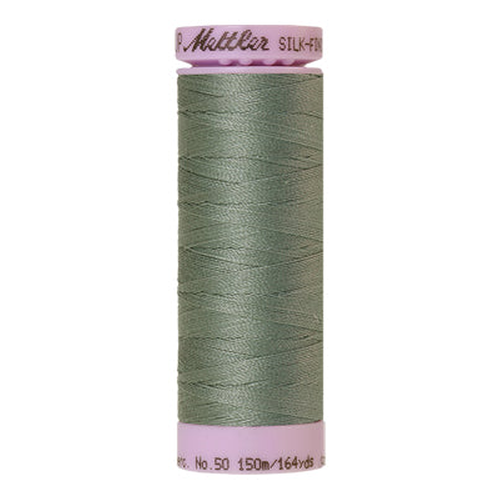 Mettler sewing thread spool in Vintage Blue (1214) - 50wt 150m
